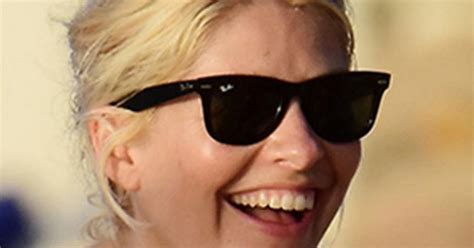 Holly Willoughby Splashes About In Plunging Swimsuit During Barbados