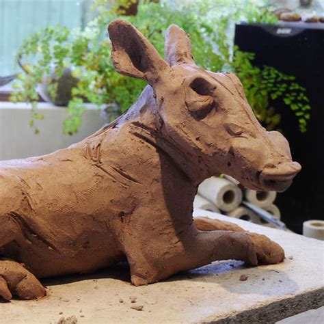 warthog sculpture family nick mackman animal sculpture