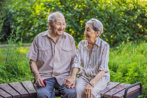 Elderly Couple In Love Senior Husband And Wife Holding Hands And Bonding With True Emotions