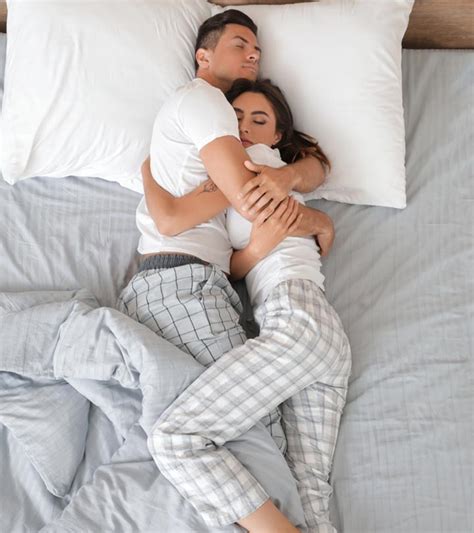 26 types of couple s sleeping positions and what they say about your relationship