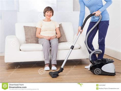 Well, if yes, then you're at the right place because in this article we're going to discuss a product which is considered as one of the best vacuum cleaner for sofa which is specially designed for sofa cleaning. Caretaker Cleaning Floor While Senior Woman Sitting On ...