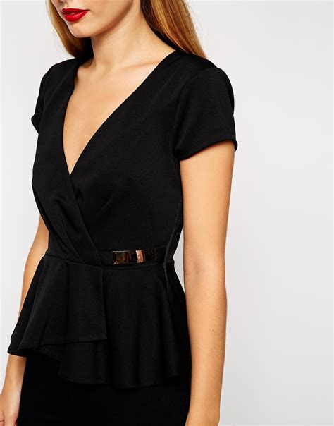 Beach sweetheart top peplum one piece is rated 4.3 out of 5 by 42. Asos Wrap Front Peplum Top With Gold Bar in Black | Lyst