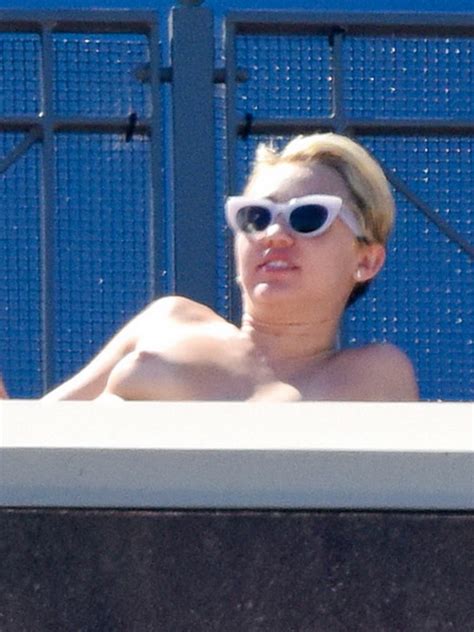 Miley Cyrus Tanning Topless At The Hotel Balcony In Sydney Porn