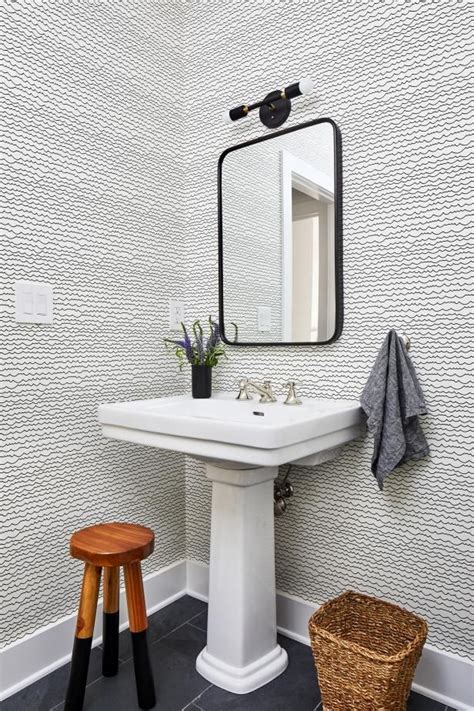 Modern Powder Room Features Black And White Wallpaper A Pedestal Sink
