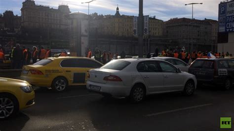 hundreds of taxis block central prague in anti uber protest video — rt world news