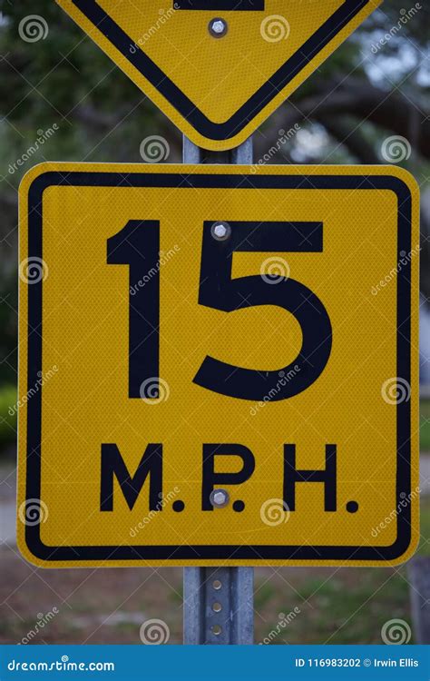 15 Miles Per Hour Black And Yellow Traffic Street Sign Editorial
