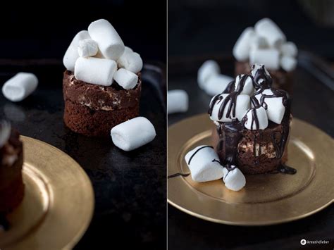 Schokoladen cupcakes mit marshmallow topping. Schoko Törtchen mit Nutella Fudge und Marshmallows ...