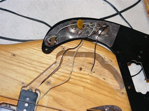 Precision bass pickups have one ground wire and one hot or live wire. Wiring on a 1975 Fender Precision | TalkBass.com