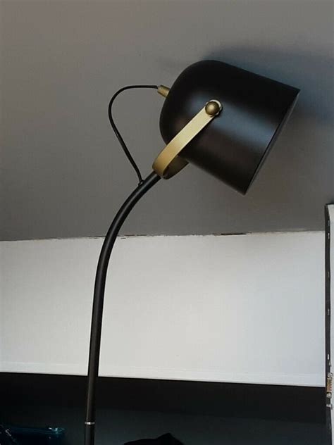 Maybe you would like to learn more about one of these? Pair of Black and gold floor lamps really good condition ...