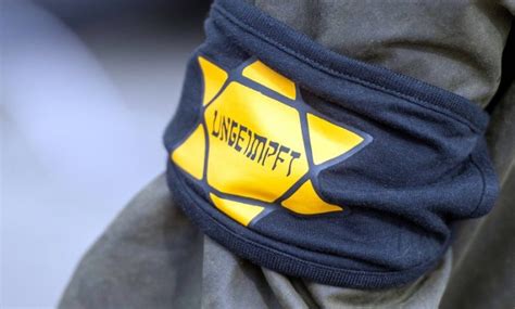 ألمانيا دعوات لمنع المتظاهرين ضد إجراءات الإغلاق من ارتداء شارة نجمة داوود الصفراء