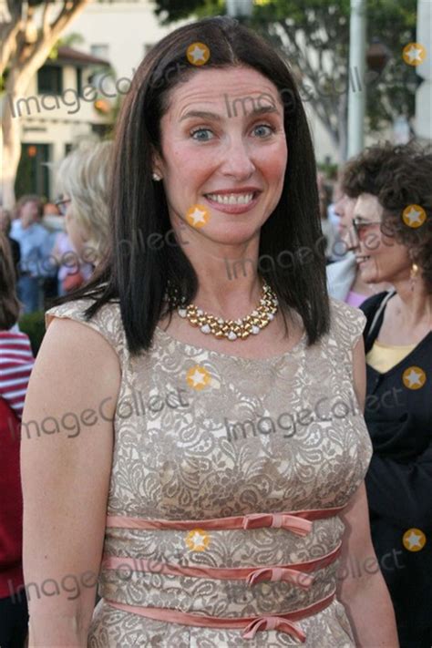 Photos And Pictures Mimi Rogers At The Door In The Floor World Premiere For The Santa