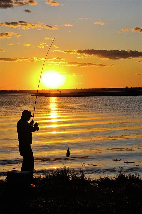 Sunset Fisherman Photograph By Charles Eberson