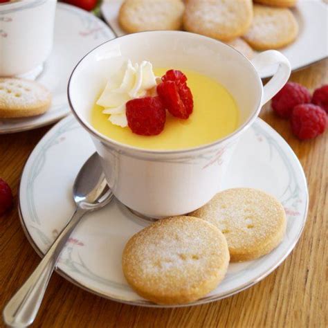 Homemade Zingy And Tangy Lemon Posset Served With Homemade All Butter Shortbread Biscuits