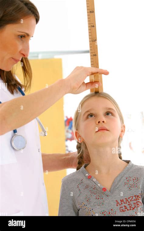 Measuring Height In A Child Stock Photo Alamy
