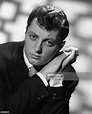 Entertainer James Mitchum poses for a 20th Century Fox Records... News ...