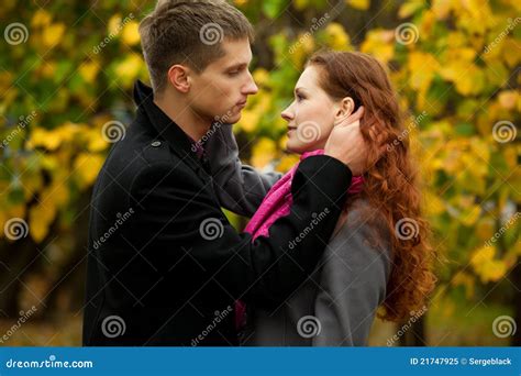 Young Man Lovingly Looks At His Girlfriend Stock Image Image Of Dating Autumn 21747925