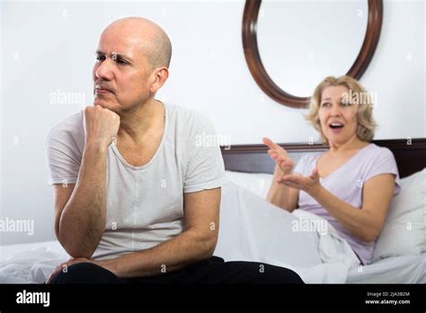 Mature Couple Having Quarrel In Bedroom Stock Photo Alamy