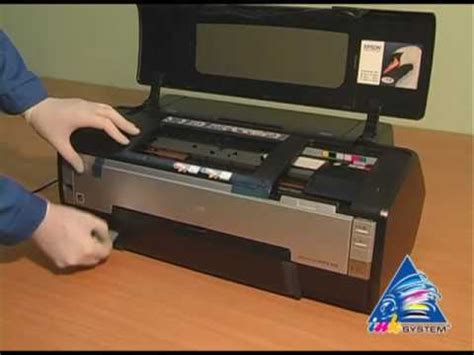 A printer's ink pad is at the end of its service life. CISS installation on EPSON Photo 1410 - YouTube
