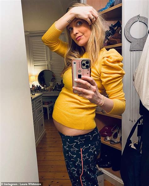 Pregnant Laura Whitmore Enjoys A Sunday Stroll By The River With