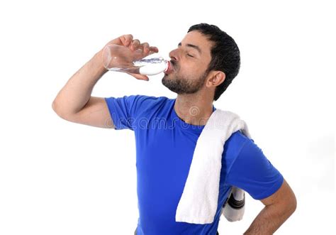 Man Drinking Refreshing Water After Workout At Beach Drink Stock Image