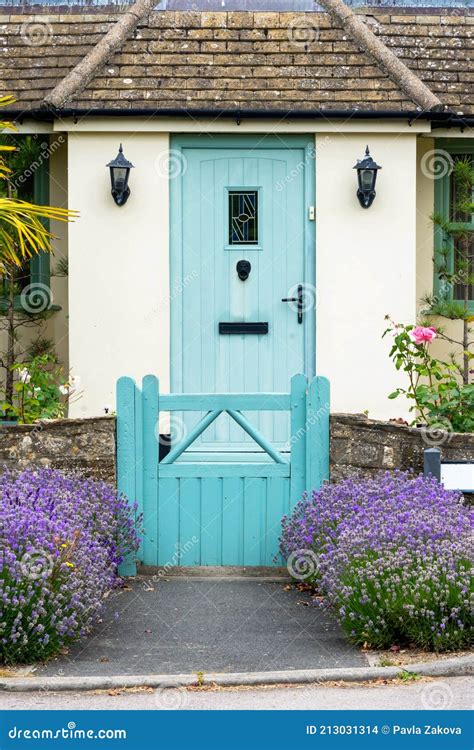 Blue Cottage Door And Front Garden Flowers Stock Photo Image Of