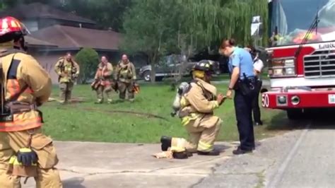 Firefighter Proposal Uses Smoke Mirrors To Surprise Police Officer