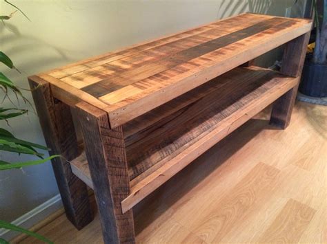 You will not find a tv stand more beautiful than this given one. Reclaimed Wood Notched Leg Media Console / TV Stand w ...
