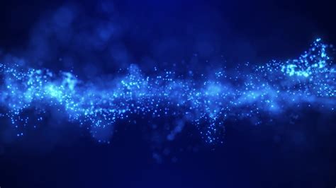 Abstract Background Of Magic Particles In Blue Color Particles Glow
