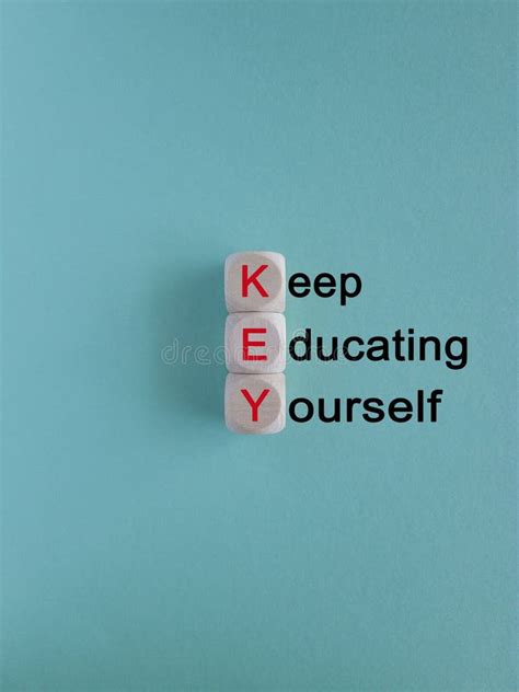 Key Keep Educating Yourself Symbol Wooden Cubes With Red Words Key