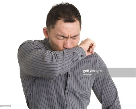 Coughing Or Sneezing Man High Res Stock Photo Getty Images