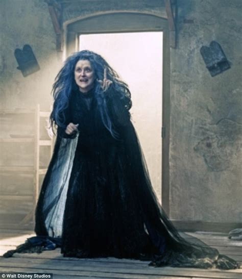 meryl streep towers over the first into the woods poster as the menacing witch daily mail online