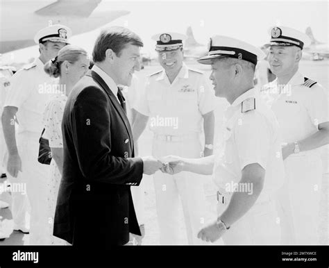 Secretary Of The Navy John F Lehman Jr Is Welcomed By Rear Admiral