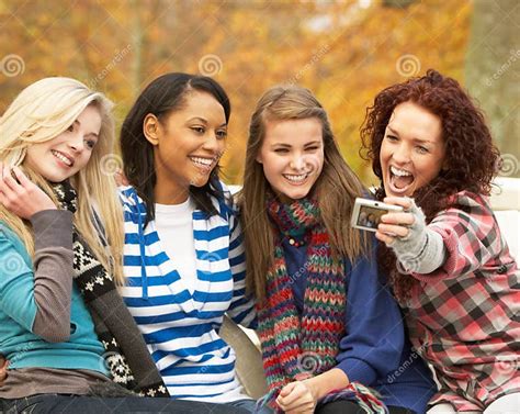 Group Of Four Teenage Girls Taking Picture Stock Photo Image Of
