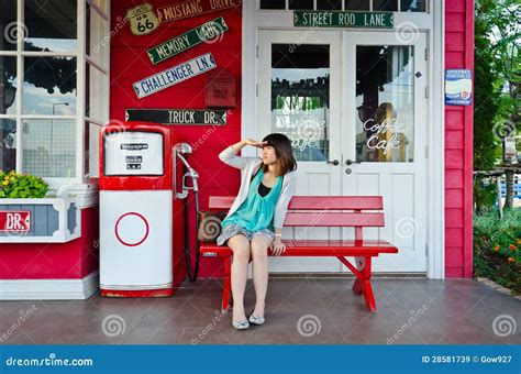 Cute Thai Girl Is Eating Pink Candyfloss Royalty Free Stock Image