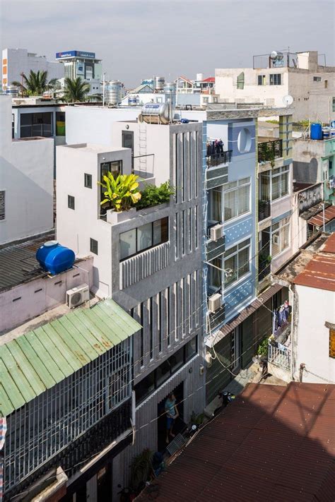 Narrow Vertical Home Maximizes Light And Space In Ho Chi Minh City