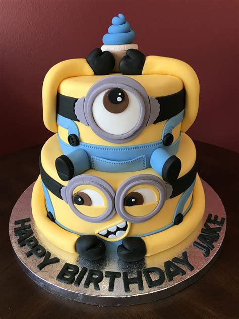 Minions make a fabulous theme for children's birthday parties for boys and girls and delight everyone from toddlers to grandparents another wonderful design from hot mama's cakes features three minions on top on a single tier circular cake decorated with minion goggles. Minion Birthday Cake | Minion birthday cake, Minion birthday, Cake