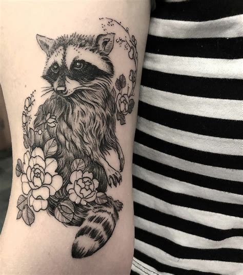 Cute Raccoon Tattoo With Floral Design