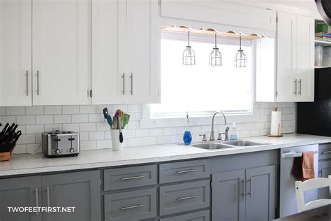 This kitchen upgrade has been in the works for a while now—its new owners waited for the right renovation moment for two years, then made most of the changes you'll see, then replaced the floors another two years. Update kitchen cabinets without replacing them by adding trim