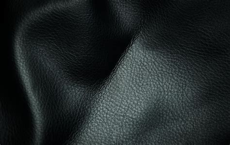 Premium Photo A Black Leather Fabric With A Textured Texture