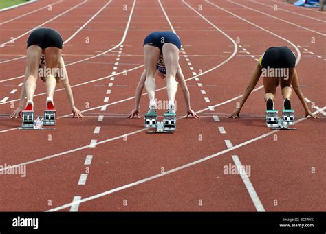Female Sprinters In Starting Blocks Hi Res Stock Photography And Images