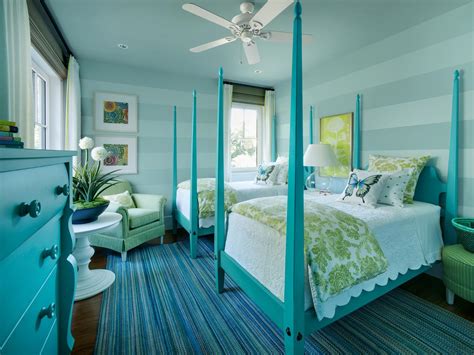 Aqua Bedroom With Twin Poster Beds And Striped Walls Hgtv
