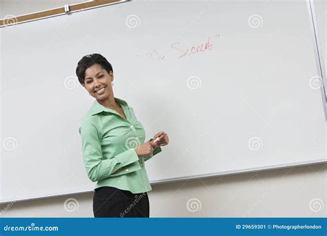 business woman standing in front of whiteboard stock image image of beautiful american 29659301