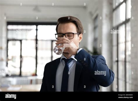 Thirsty Male Employee Drink Clean Mineral Water Stock Photo Alamy