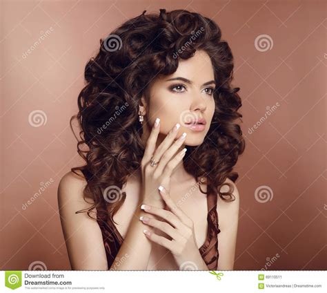 Beautiful Girl With Long Curly Hair Makeup Manicured Nails Stock