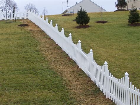 Novel cedar fence simple side concrete palisade footing to drainpipe urine forth. How To Install A Picket Fence On A Slope