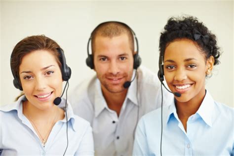 Portrait Of Happy Call Center Employees Stock Photo Download Image