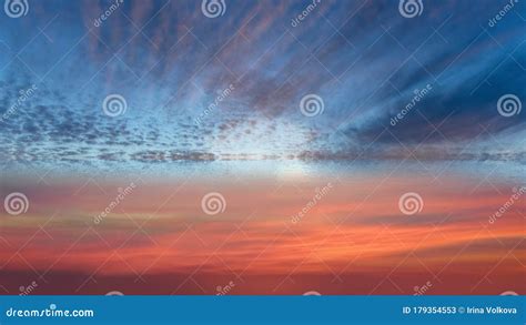 Blue Pink Sunset On Cloudy Sky Yellow Clouds Skyline Water Sea