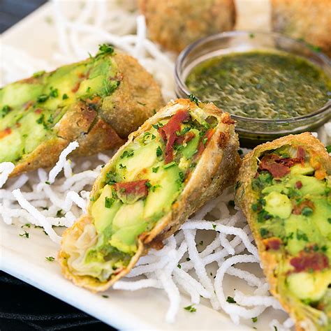 Add about ¼ to ⅓ cup of avocado mixture onto the center of each egg roll wrapper. Avocado Egg Rolls - Yelp