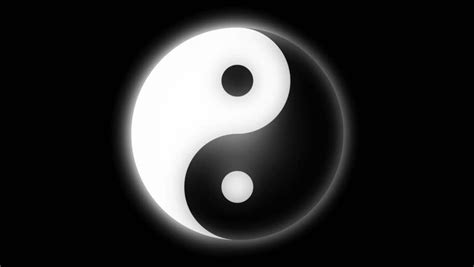 Black And White Yin Yang Symbol Rotates In Separate Halves Shallow