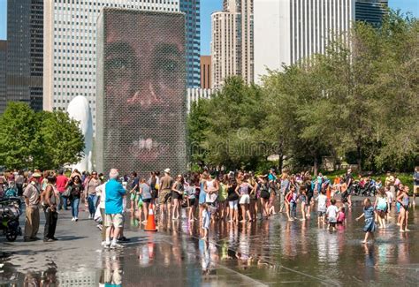 Visitors Enjoying The Popular Crown Fountain In Millennium Park On A